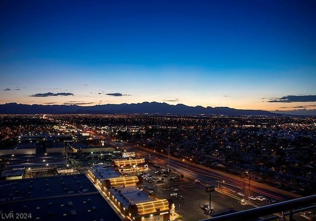 aerial view at dusk with a mountain view