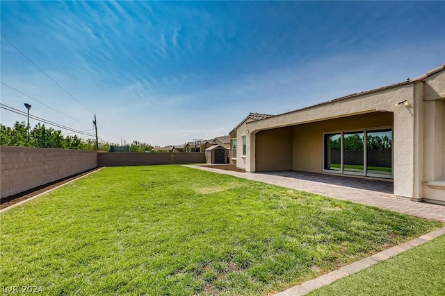 view of yard with a patio area