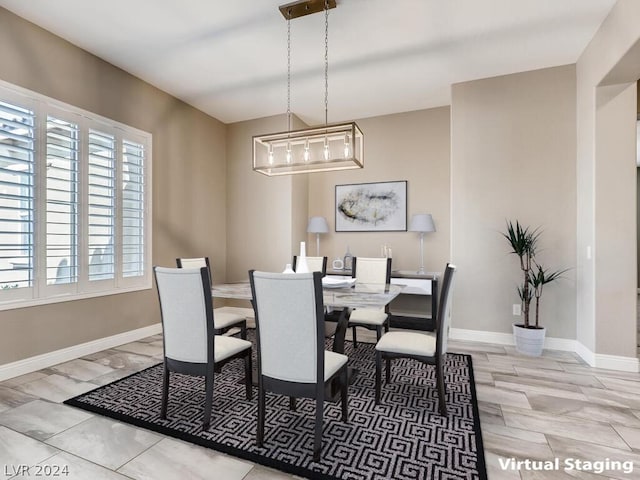 dining room with plenty of natural light