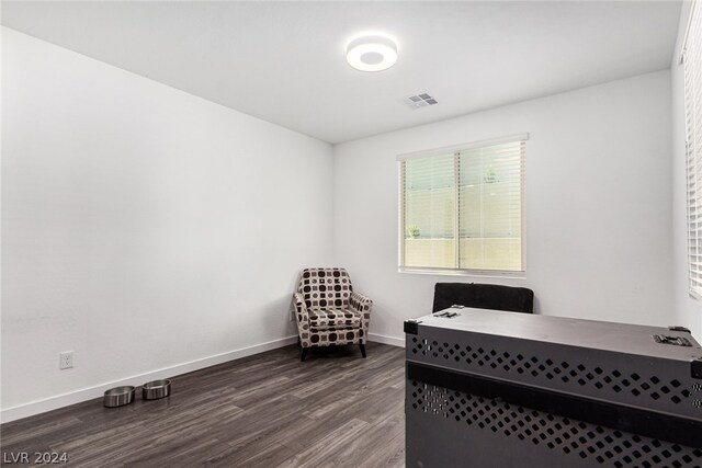 office area featuring dark wood-type flooring