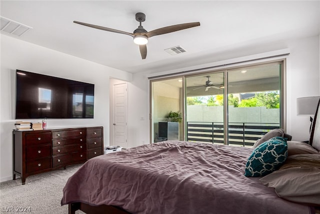 carpeted bedroom with ceiling fan and access to outside