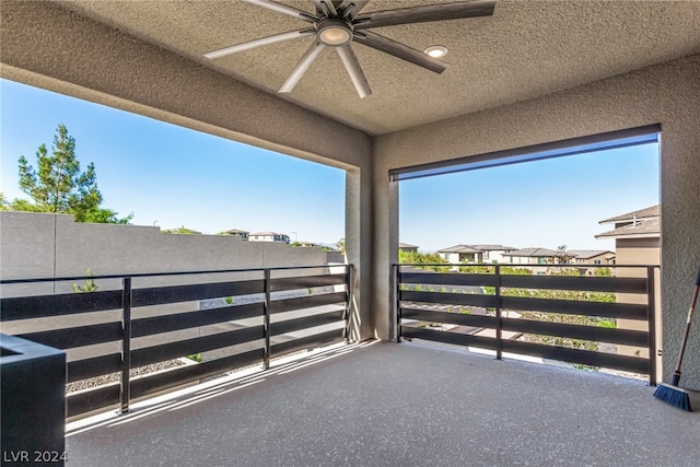 balcony featuring ceiling fan