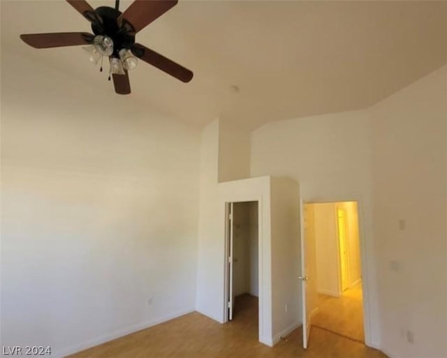 unfurnished bedroom with vaulted ceiling and ceiling fan