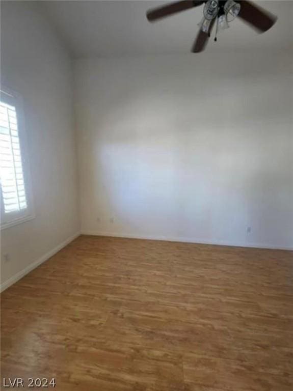 unfurnished room featuring ceiling fan and wood-type flooring