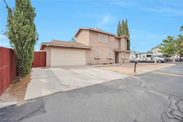 view of property featuring a garage