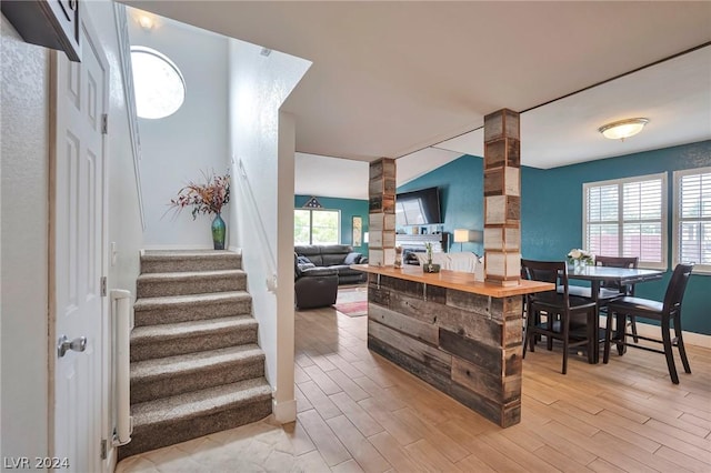 kitchen featuring wood counters, light hardwood / wood-style floors, and a wealth of natural light