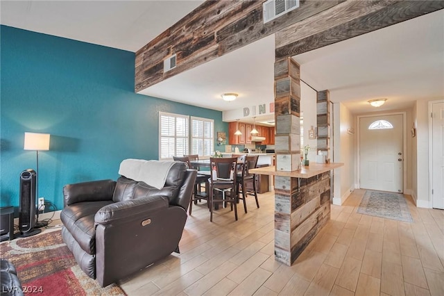 living room with light hardwood / wood-style floors