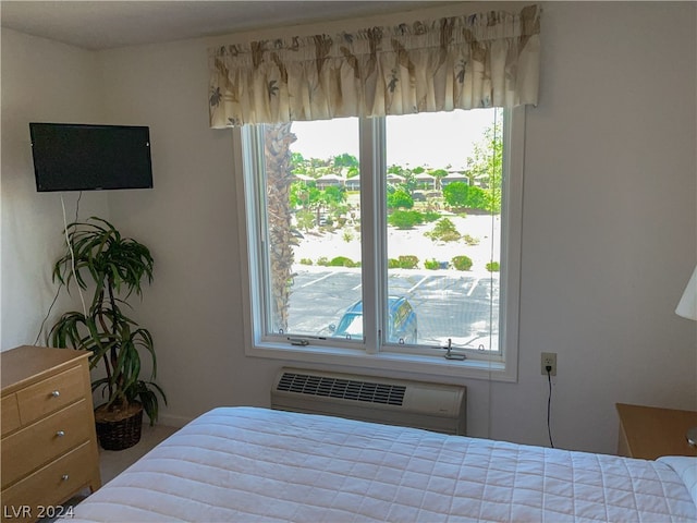 bedroom featuring radiator heating unit