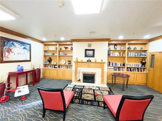 carpeted living room featuring built in shelves and crown molding