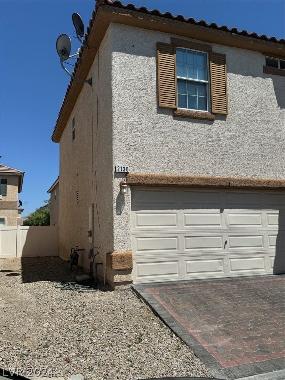 exterior space featuring a garage