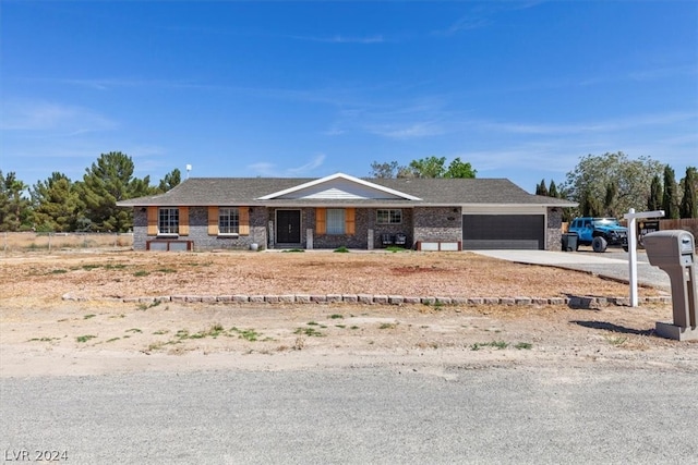 ranch-style house featuring a garage