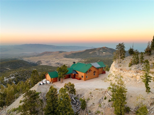 aerial view at dusk with a mountain view