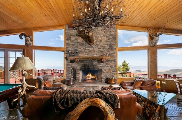 living room featuring a stone fireplace, wooden ceiling, high vaulted ceiling, and pool table