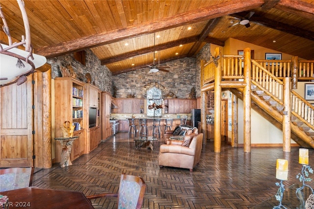 unfurnished living room featuring ceiling fan, dark parquet flooring, and wood ceiling