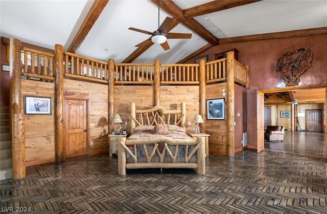 bedroom with dark parquet floors and wood walls