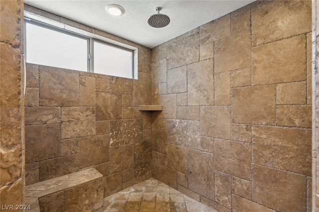 details featuring a tile shower