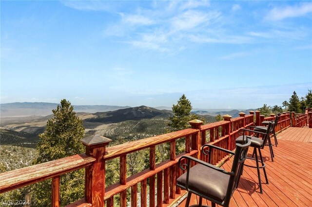 4910 Cougar Ridge Trl, Mount Charleston, NV 89124 - wooden deck with a mountain view