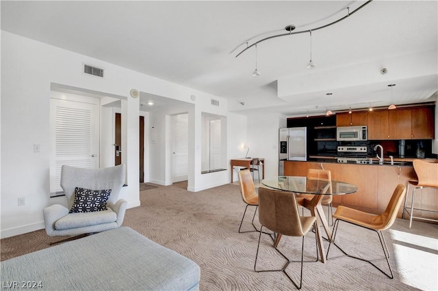 29 Montelago Blvd Unit 201, Henderson, NV 89011 - dining area featuring light carpet and baseboards
