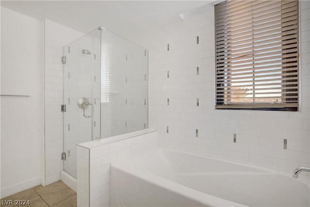 29 Montelago Blvd Unit 201, Henderson, NV 89011 - full bath featuring a bath, a stall shower, and tile patterned flooring