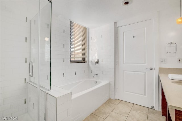 29 Montelago Blvd Unit 201, Henderson, NV 89011 - bathroom featuring tile patterned flooring, vanity, and independent shower and bath