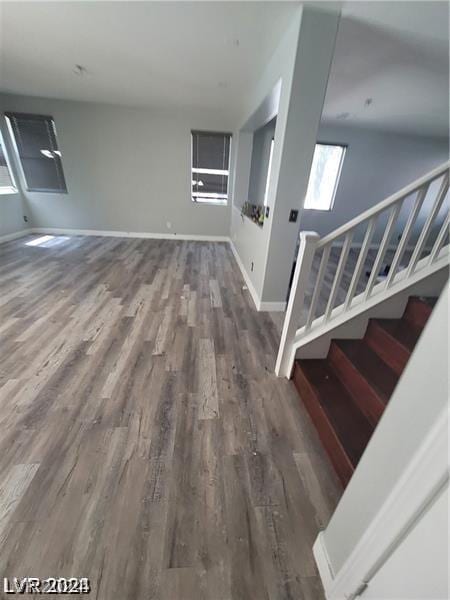 interior space with dark hardwood / wood-style flooring