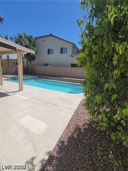 view of pool with a patio