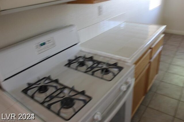 kitchen featuring white gas range