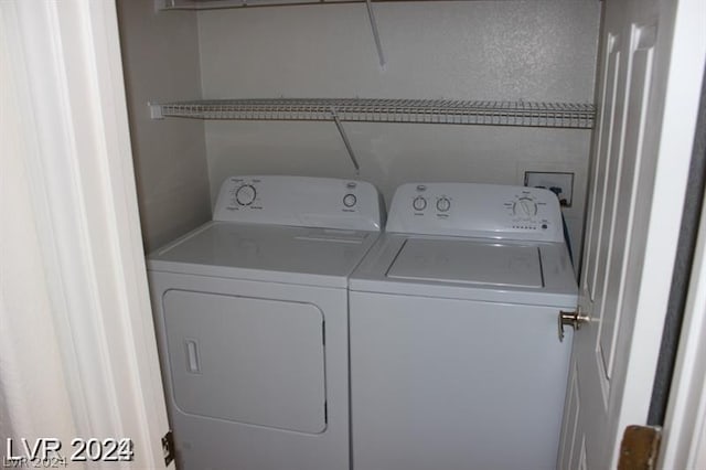 laundry area featuring independent washer and dryer