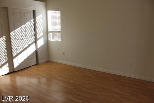 spare room featuring light hardwood / wood-style flooring