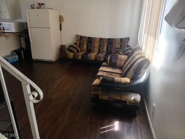 living room with wood finished floors