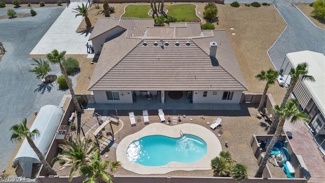 view of swimming pool featuring a patio area