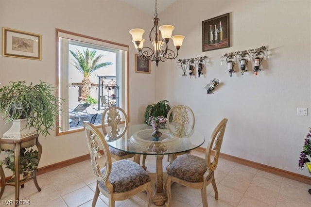 tiled dining area with an inviting chandelier