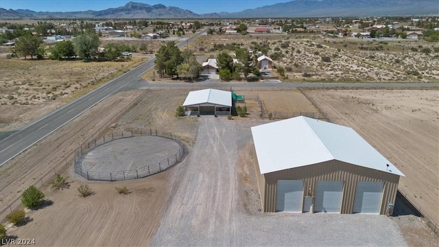 drone / aerial view featuring a mountain view