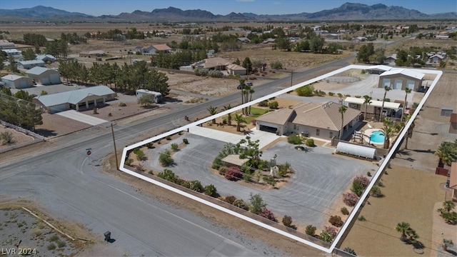 bird's eye view with a mountain view