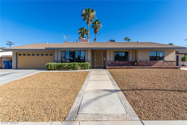 single story home with a garage