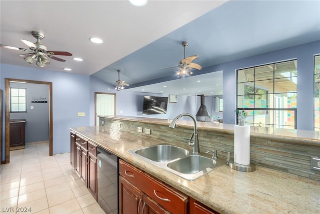 kitchen featuring ceiling fan, light tile flooring, black dishwasher, backsplash, and sink