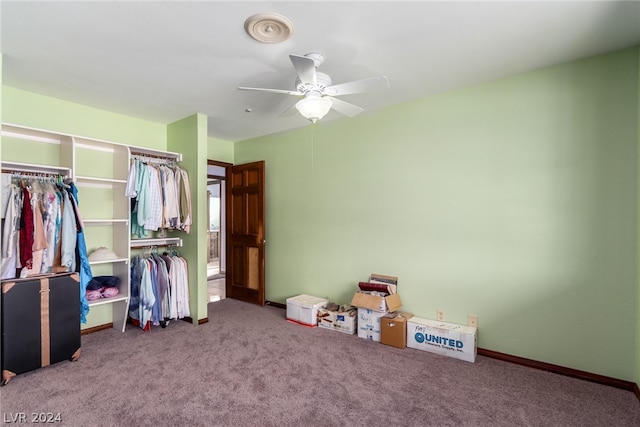 bedroom featuring a closet, ceiling fan, and carpet floors