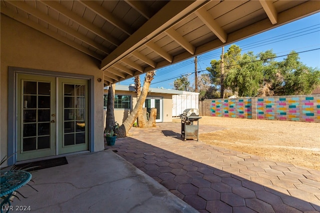 view of patio featuring french doors