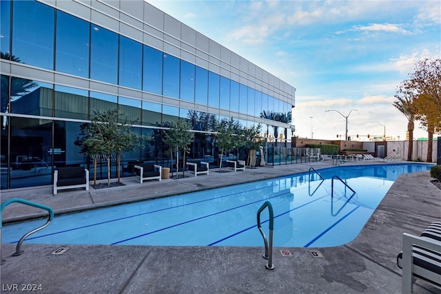 view of swimming pool with a patio