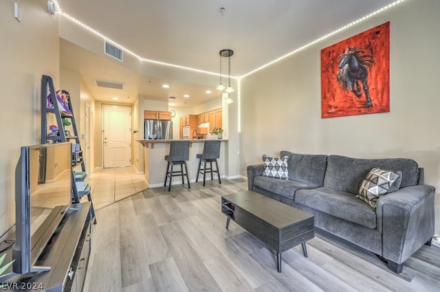 living room with light wood-type flooring