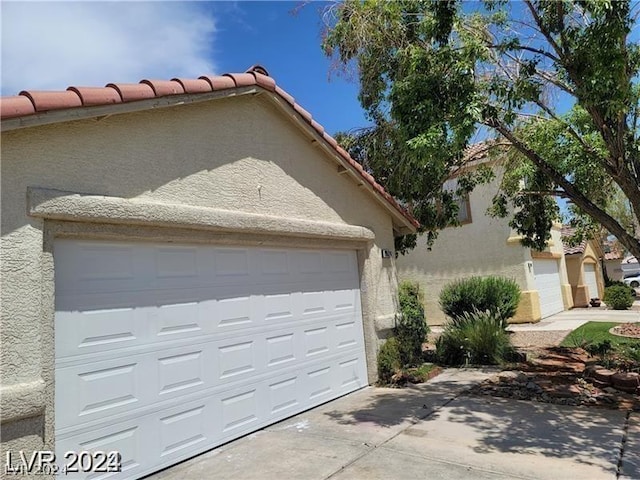 exterior space with a garage