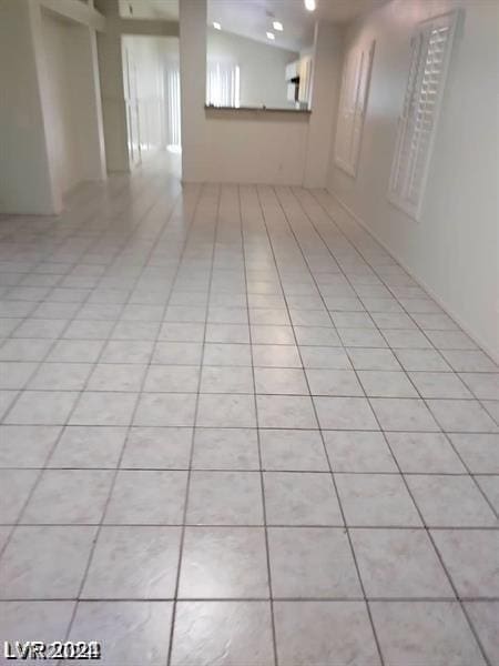 basement with light tile patterned floors