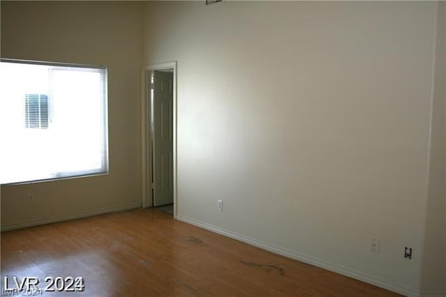 spare room with light wood-type flooring