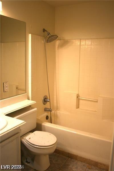 full bathroom with tile patterned flooring, vanity, toilet, and shower / bathtub combination