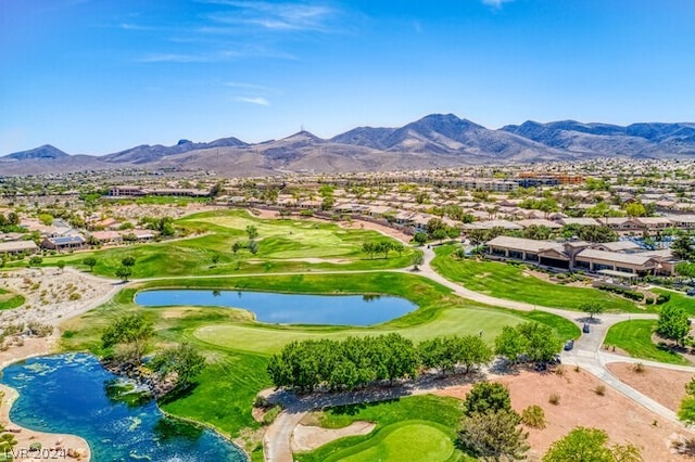 birds eye view of property featuring a water and mountain view