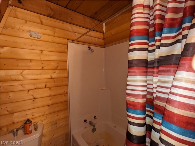 bathroom with shower / bath combo, toilet, wood ceiling, and wooden walls