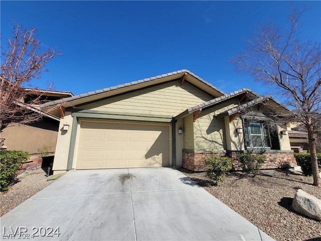 ranch-style home with a garage