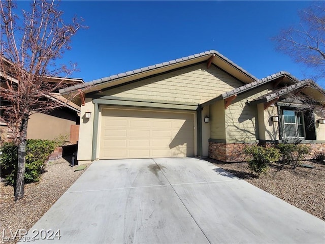 single story home with a garage