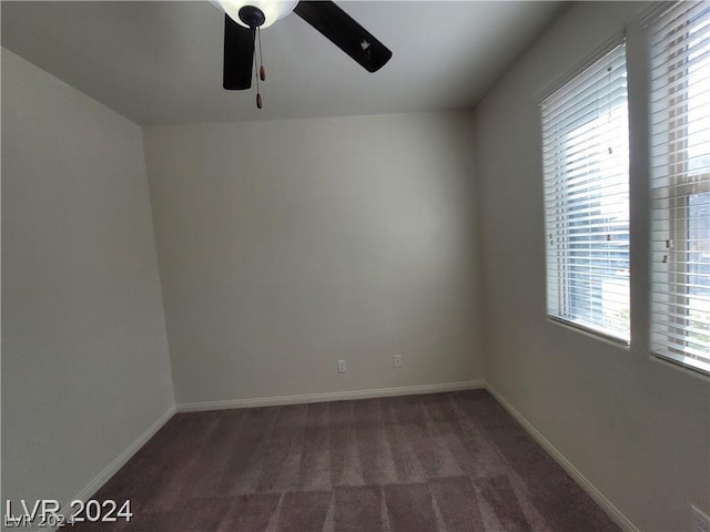 carpeted empty room with ceiling fan