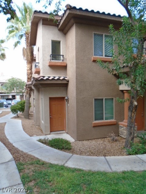 exterior space with a balcony